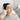 Dermatologist use a tiny loop extraction tool on a woman's blackheads in a sterile clinic